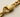 Detailaufnahme eines 916er Feingold-Armbands mit Karabinerverschluss – Symbol für Reinheit und Wertbeständigkeit von Gold
